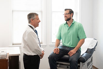 Dr. Lasin Consulting with Patient